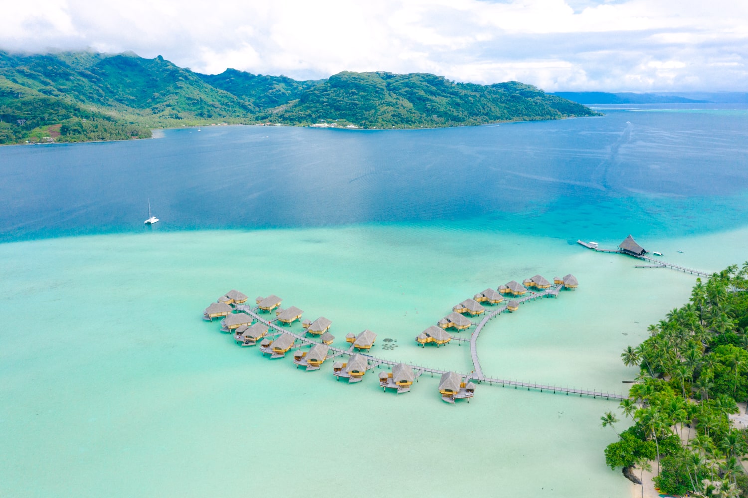 Drone Aerial Photography - Bora Bora lagoon shade of blue overwater bungalows