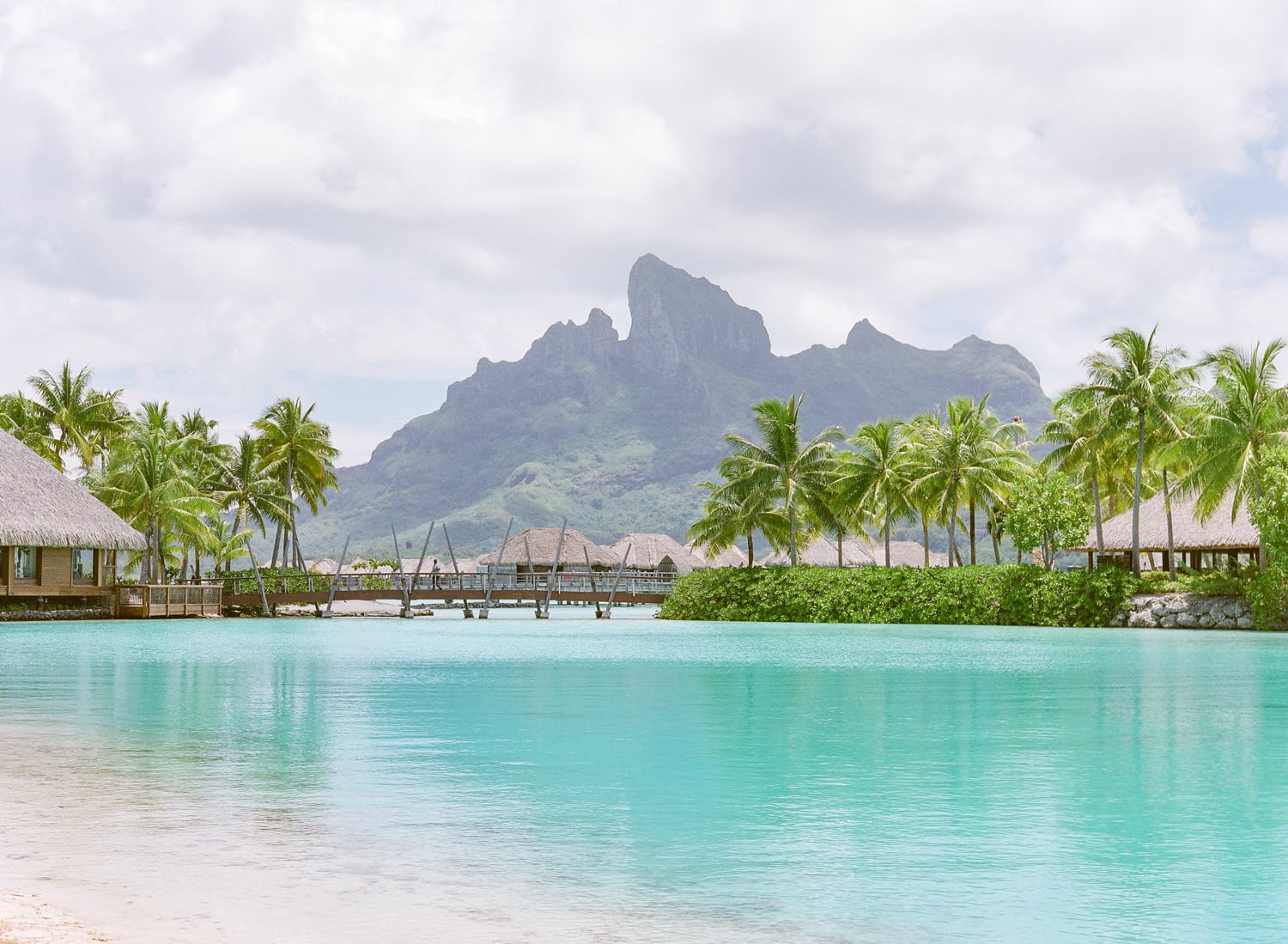 Inside-resort view, lagoon and mount otemanu in Bora Bora in afternoon