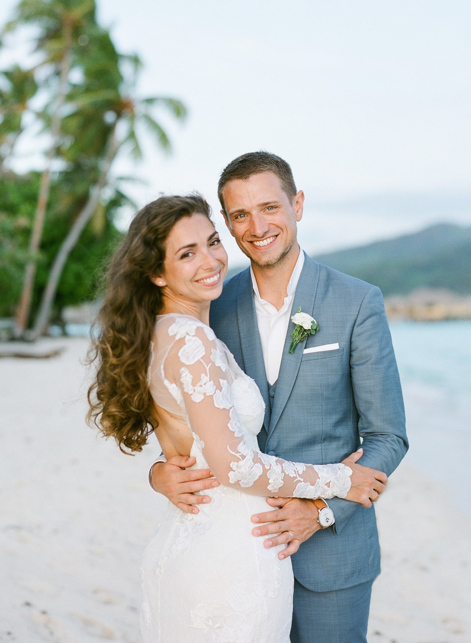 The bride and groom portrait at sunset in Bora Bora with soft light